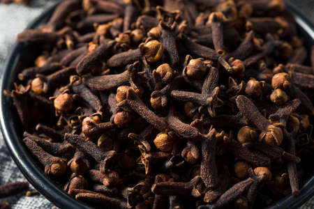Dry Organic Clove Spice in a Bowlの写真素材