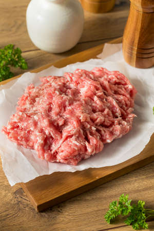 Raw Red Organic Ground Pork Ready to Cookの写真素材