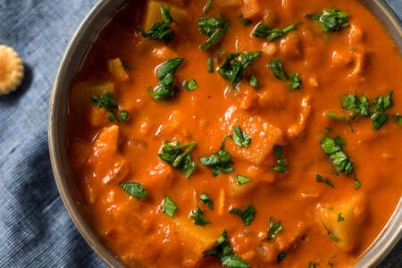 Homemade Red Tomato Manhattan Clam Chowder with Parsley