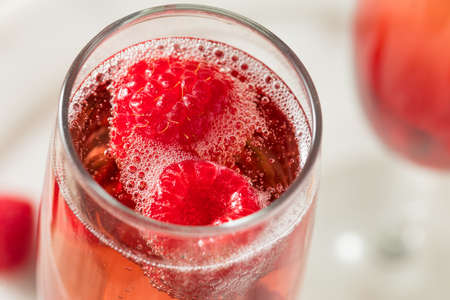 Refreshing Alcoholic Kir Royale with Champagne Raspberries