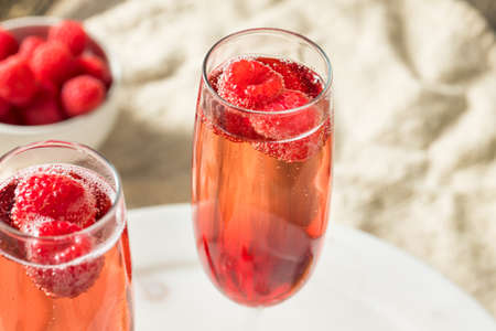 Refreshing Alcoholic Kir Royale with Champagne Raspberries