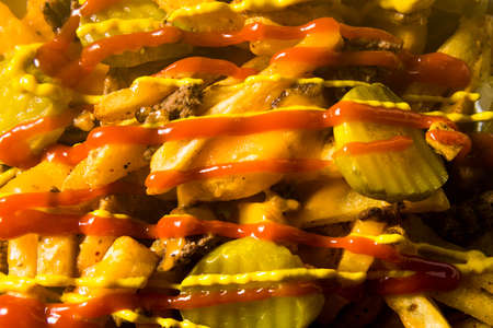 Homemade Loaded Cheeseburger Cheese Fries with PIckles and Ketchup
