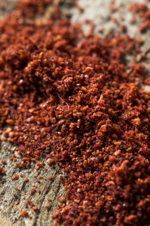 Raw Red Organic Dried Sumac in a Bowlの写真素材