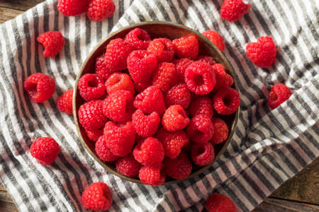 Raw Organic Red Raspberries in a Bowl