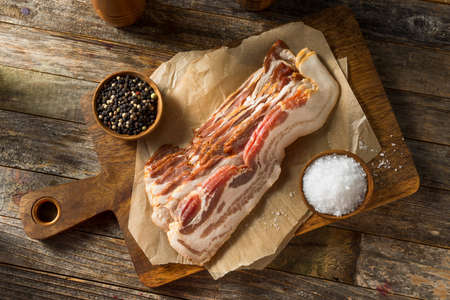 Raw Organic Uncured Salty Bacon Ready to Cookの写真素材