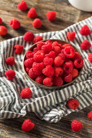 Raw Organic Red Raspberries in a Bowl