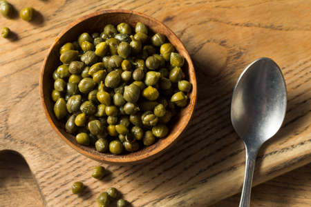 Organic Pickled Canned Capers in a Bowlの写真素材