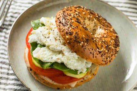 Homemade Healthy Eggwhite Bagel Sandwich with Tomato and Cucumberの写真素材