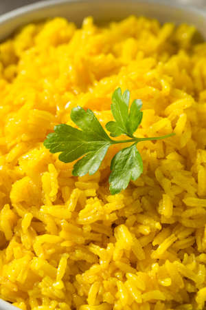 Homemade Steamed Turmeric Rice in a Bowlの写真素材