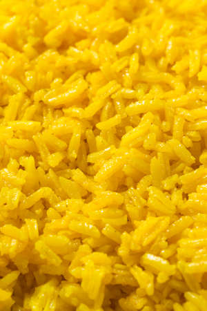 Homemade Steamed Turmeric Rice in a Bowlの写真素材