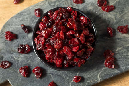 Raw Red Organic Dried Cranberries in a Bowl