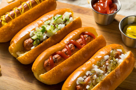 Healthy Homemade Turkey Hot Dogs with Ketchup Mustard and Onionの写真素材