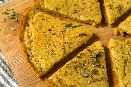 Homemade Italian Chickpea Socca Flatbread with Rosemary and Olive Oilの写真素材