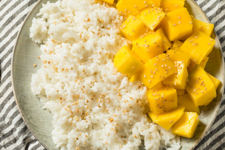 Homemade Mango Sticky Rice with Coconut and Sesame Seedsの写真素材