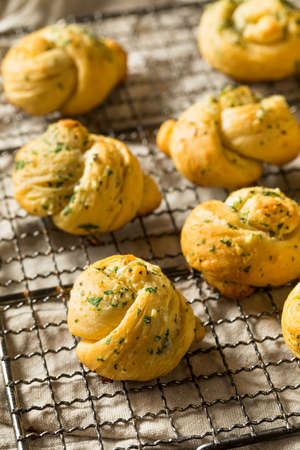 Homemade Buttery Garlic Knot Bread with Parsleyの写真素材