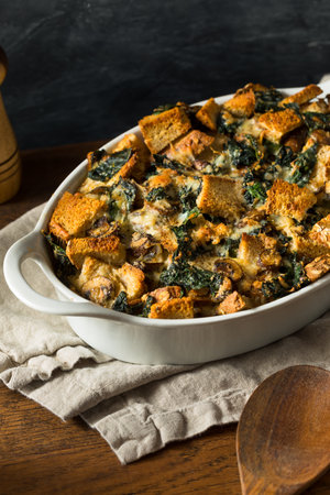 Homemade Savory Bread Pudding with Eggs Cheese and Kaleの写真素材