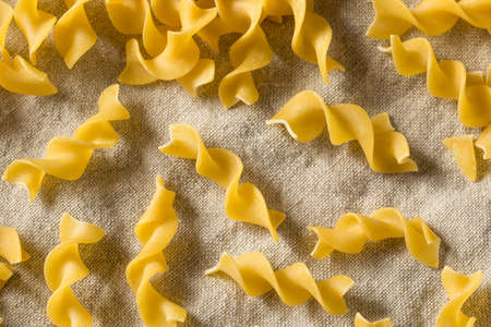 Raw Dry Egg Noodles Ready to Cookの写真素材