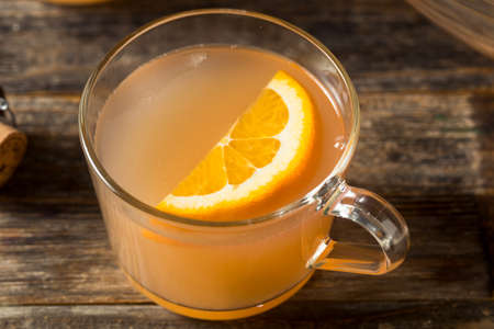 Boozy Champagne Mothers Ruin Orange Punch with Ginの写真素材