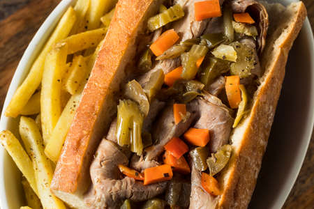 Homemade Chicago Italian Beef Sandwich with Giardanarra and Friesの写真素材
