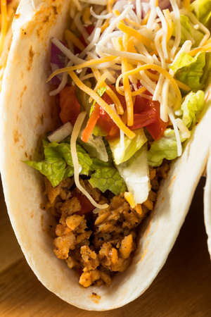 Homemade American Soft Shell Beef Tacos with Lettuce Tomato Cheeseの写真素材