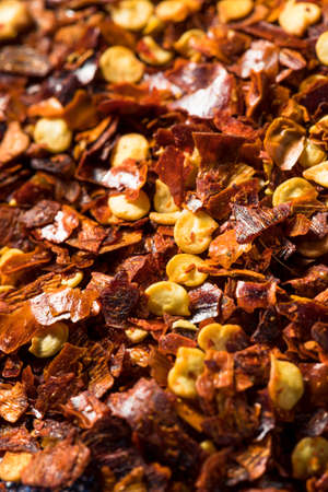 Raw Organic Red Pepper Flakes in a Bowl