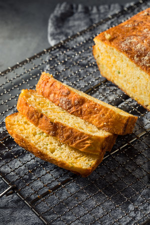 Homemade Cheesy Bread Loaf Cut into Slices