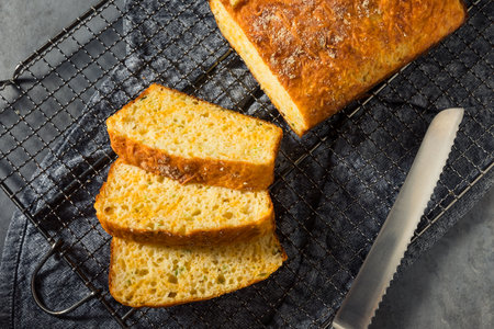 Homemade Cheesy Bread Loaf Cut into Slices