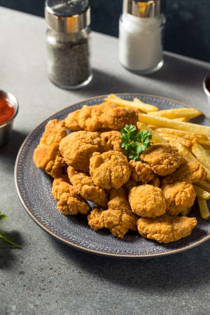 Homemade Fried Chicken Nuggets and Fries with Ketchupの写真素材