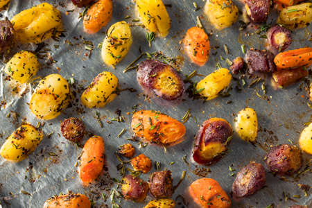 Healthy Homemade Roasted Rainbow Carrots with Thyme and Rosemaryの写真素材