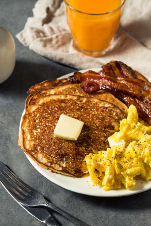 Homemade American Pancake Breakfast with Eggs and Bacon