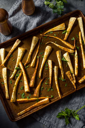 Healthy Homemade Roasted Parsnips with Salt and Pepperの写真素材