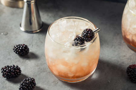 Boozy Refreshing Bramble Cocktail with Gin and Blackberriesの写真素材