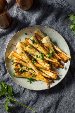 Healthy Homemade Roasted Parsnips with Salt and Pepperの写真素材