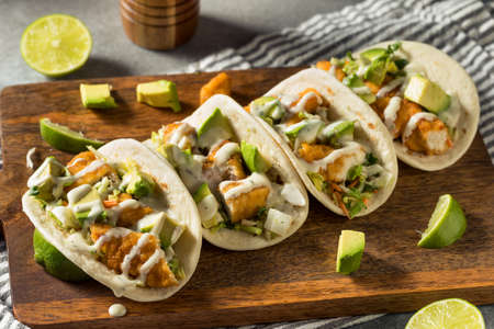 Homemade Fried Chicken Tacos with Lime and Avocadoの写真素材