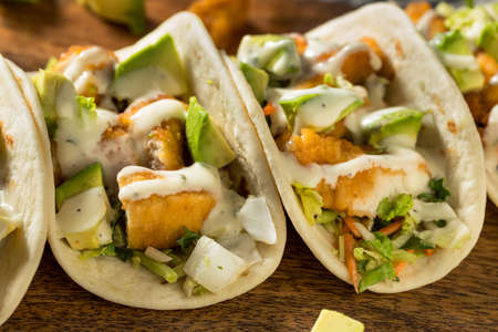 Homemade Fried Chicken Tacos with Lime and Avocadoの写真素材