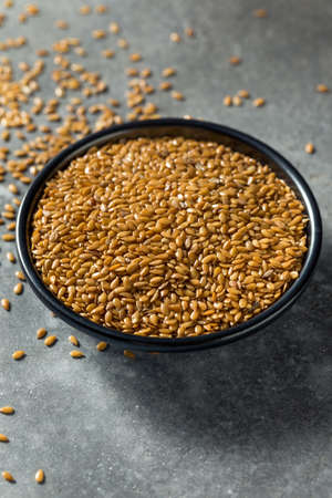 Healthy Organic Raw Flax Seeds in a Bowlの写真素材
