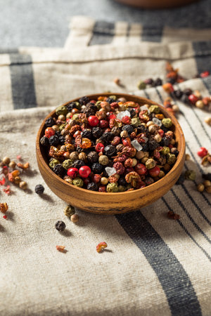 Raw Dry Organic Sichuan Peppercorn Mix in a Bowlの写真素材