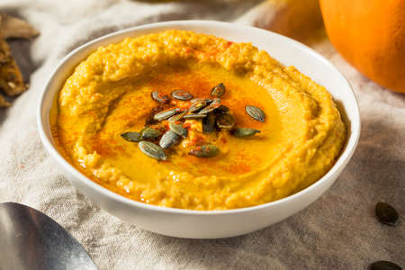 Healthy Organic Pumpkin Spice Hummus with Olive Oilの写真素材