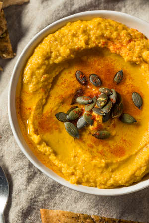 Healthy Organic Pumpkin Spice Hummus with Olive Oilの写真素材