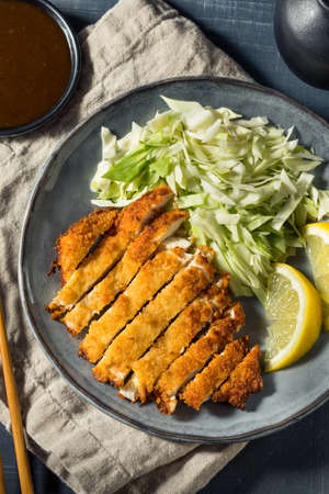 Homemade Japanese Chicken Katsu with Cabbage and Lemonの写真素材