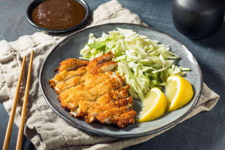 Homemade Japanese Chicken Katsu with Cabbage and Lemonの写真素材