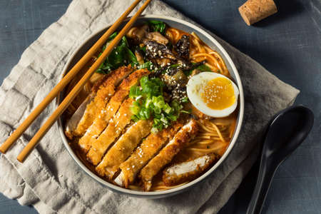Homemade Japanese Chicken Katsu Ramen with Scallions and Eggの写真素材