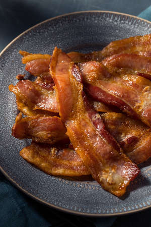 Homeade Greasy Baked Bacon for Breakfast on a Plate