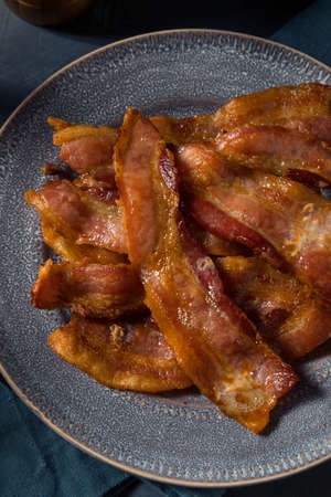 Homeade Greasy Baked Bacon for Breakfast on a Plate