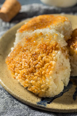Homemade Japanese Grilled Yaki Onigiri Rice Ball with Tuna Fillingの写真素材