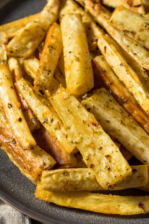 Homemade Roasted Parnsip Fries with Salt Pepper and Thymeの写真素材
