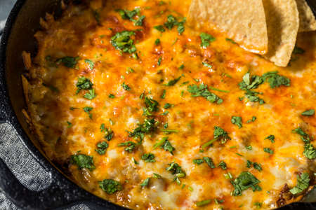 Homemade Mexican Chorizo Queso Oaxaca Dip with Tortilla Chipsの写真素材