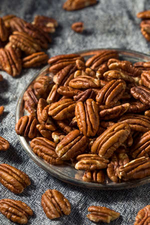 Raw Brown Oranic Pecan Nuts in a Bowl