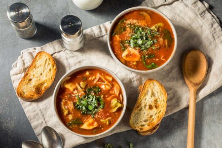 Homemade Italian Tortellini Soup with Cheese and Basil