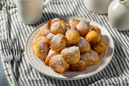 Homemade Italian Zeppole Donuts with Powdered Sugar for Christmas
